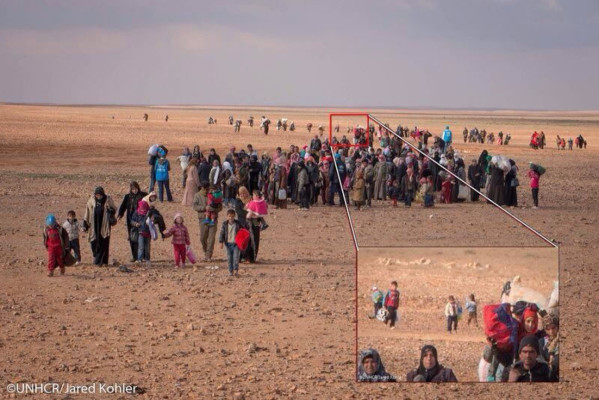 Fotos: Así huyen los niños de la guerra en Siria