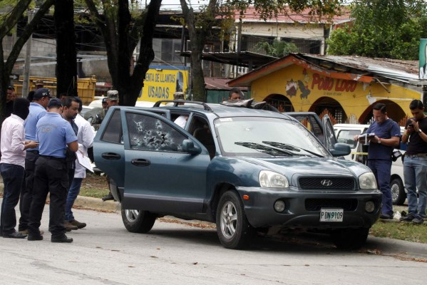 Más de 60 casquillos hallaron en escena de transportista y su hijo en San Pedro Sula