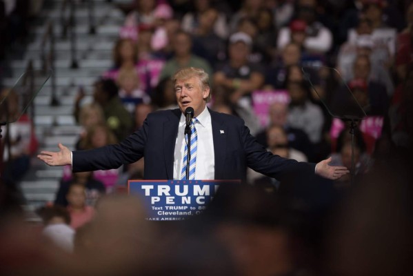 CLEVELAND, OH - OCTOBER 22: Republican presidential nominee Donald Trump addresses supporters during a campaign stop at the International Exposition Center on October 22, 2016 in Cleveland, Ohio. Trump and Democratic presidential nominee Hillary Clinton continue to campaign as Election Day nears. Justin Merriman/Getty Images/AFP== FOR NEWSPAPERS, INTERNET, TELCOS & TELEVISION USE ONLY ==