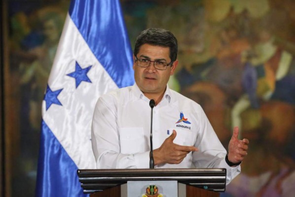 Juan Orlando Hernández sancionó reforma al 1.5% del ISR