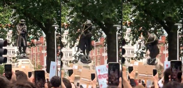 Video: Manifestantes derrocan y tiran al río la estatua de comerciante de esclavos en Reino Unido