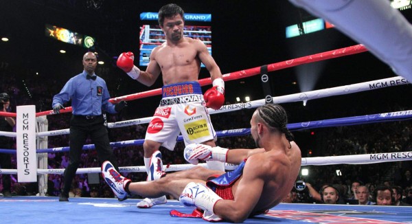 Pacquiao vence a Thurman y captura cetro wélter