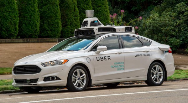 Uber suspende pruebas de vehículos autónomos