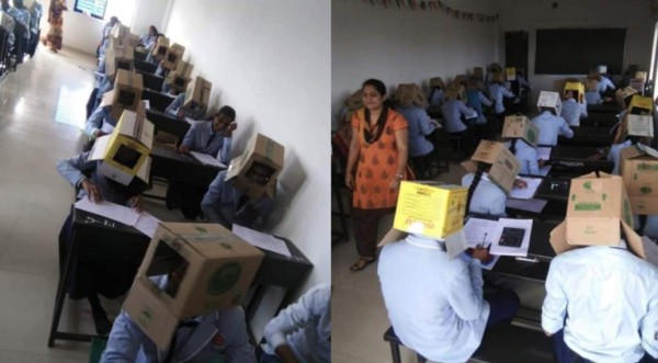Colegio en India: Le ponen cajas de cartón en la cabeza a sus estudiantes para que no copien