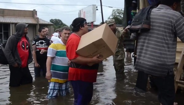 This August 14, 2016 image from video provided by the Louisiana Army and Air National Guard shows residents being evacuated from floodwaters in Baton Rouge, Louisiana.Emergency crews in flood-devastated Louisiana have rescued more than 20,000 people after catastrophic inundations that left at least five dead, news reports said August 15. As many as 10,000 people are living in shelters after a weekend of torrential rains that has prompted the federal government to declare a disaster, according to Louisiana governor John Bel Edwards. / AFP PHOTO / Louisiana Army and Air National Guard AND AFP PHOTO / Handout / RESTRICTED TO EDITORIAL USE - MANDATORY CREDIT 'AFP PHOTO / Louisiana Army and Air National Guard ' - NO MARKETING - NO ADVERTISING CAMPAIGNS - DISTRIBUTED AS A SERVICE TO CLIENTS