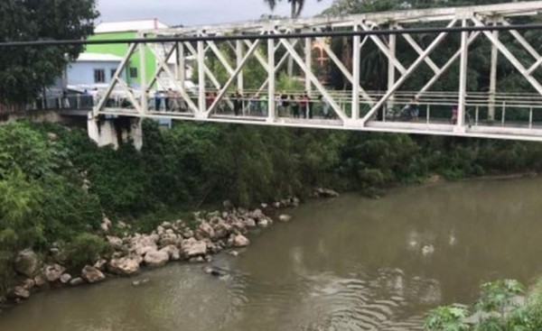 Encuentran cadáver flotando en el río Chamelecón