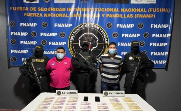 Capturan a alias 'El Saliva' y 'El Gordo', presuntos extorsionadores que operaban en la terminal de buses San Pedro Sula