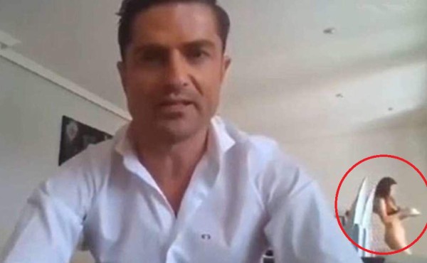 Video viral: Amante de periodista se pasea semidesnuda mientras él hace entrevista en vivo