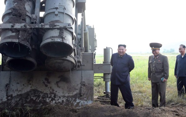 This picture taken on September 10, 2019 and released from North Korea's official Korean Central News Agency (KCNA) on September 11, 2019 shows North Korean leader Kim Jong Un attending the testing of a 'super-large multiple rocket launcher' at an undisclosed location in North Korea. - North Korean leader Kim Jong Un has supervised a fresh test of a 'super-large multiple rocket launcher' system, state media said on September 11 -- the latest in a series of provocations by Pyongyang. (Photo by KCNA VIA KNS / KCNA VIA KNS / AFP) / - South Korea OUT / REPUBLIC OF KOREA OUT ---EDITORS NOTE--- RESTRICTED TO EDITORIAL USE - MANDATORY CREDIT 'AFP PHOTO/KCNA VIA KNS' - NO MARKETING NO ADVERTISING CAMPAIGNS - DISTRIBUTED AS A SERVICE TO CLIENTSTHIS PICTURE WAS MADE AVAILABLE BY A THIRD PARTY. AFP CAN NOT INDEPENDENTLY VERIFY THE AUTHENTICITY, LOCATION, DATE AND CONTENT OF THIS IMAGE. /