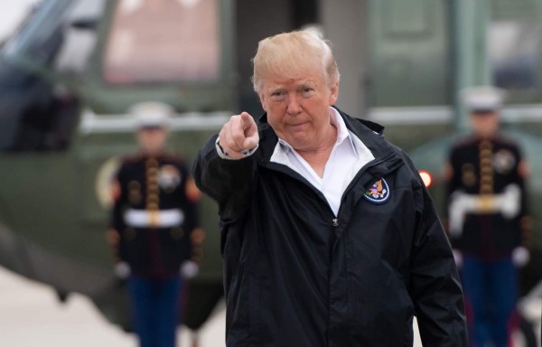 US President Donald Trump arrives to board Air Force One prior to departure from Joint Base Andrews in Maryland, November 17, 2018, as he travels to California to view wildfire damage. (Photo by SAUL LOEB / AFP)