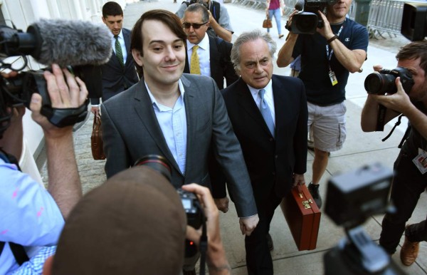 (FILES) This file photo taken on June 26, 2017 shows ex-pharmaceutical executive Martin Shkreli leaves after his appearance at the U.S. District Court for the Eastern District of New York on the first day of his securities fraud trial in the Brooklyn borough of New York City. Closing arguments got underway on July 27, 2017 in the securities fraud trial of Martin Shkreli, a former hedge fund manager and pharmaceutical executive label 'The Most Hated Man in America.' The 34-year-old, who hunched over in his chair and fiddled with his hair, risks being jailed for up to 20 years if convicted of lying to investors and running a Ponzi-like scheme across multiple firms. / AFP PHOTO / GETTY IMAGES NORTH AMERICA / TIMOTHY A. CLARY