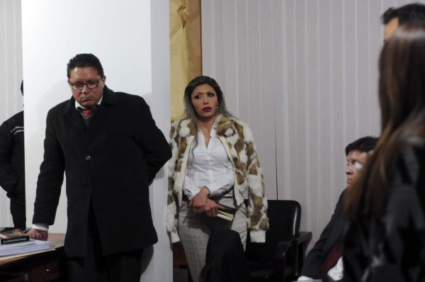 Bolivian President Evo Morales' ex-girlfriend Gabriela Zapata (C), former manager of Chinese construction firm CAMC, is pictured during her trial in which she was sentenced to ten years of imprisonment for 'illegal enrichment and improper use of public funds and services', in La Paz, on May 23, 2017. / AFP PHOTO / STR