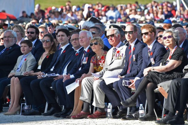 Britain's Charles, Prince of Wales (4thR), Britain's Prince William, Duke of Cambridge (3rdR), Britain's Prince Harry (2ndR), Camilla, Duchess of Cornwall (5thR), Governor General of Canada David Johnston (6thR), French President Francois Hollande (5thL), Canadian Prime Minister Justin Trudeau (4thL), his wife Sophie Gregoire (3rdL) and son Xavier (2ndL) and French Junior Minister for Veterans Jean-Marc Todeschini (L), attend a commemoration ceremony at the Canadian National Vimy Memorial in Vimy, near Arras, northern France, on April 9, 2017, marking the 100th anniversary of the Battle of Vimy Ridge, a World War I battle which was a costly victory for Canada, but one that helped shape the former British colony's national identity. / AFP PHOTO / POOL / Philippe HUGUEN