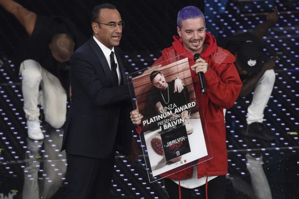 SANREMO, ITALY - FEBRUARY 12: Carlo Conti and J Balvin attend the fourth night of the 66th Festival di Sanremo 2016 at Teatro Ariston on February 12, 2016 in Sanremo, Italy. (Photo by Venturelli/Getty Images)