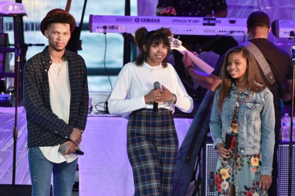 DETROIT, MI - AUGUST 30: Aretha Franklin's grandchildren Jordan, Gracie, and Victorie speak on stage at a Tribute Concert to celebrate the life of songstress Aretha Franklin at Chene Park on August 30, 2018 in Detroit, Michigan. Aaron J. Thornton/Getty Images/AFP