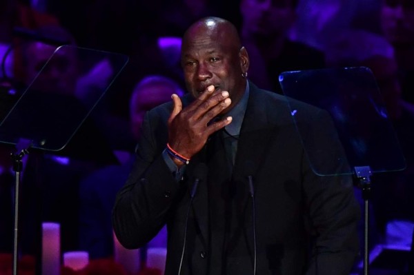 Retired US basketball player Michael Jordan cries as he speaks during the 'Celebration of Life for Kobe and Gianna Bryant' service at Staples Center in Downtown Los Angeles on February 24, 2020. - Kobe Bryant, 41, and 13-year-old Gianna were among nine people killed in a helicopter crash in the rugged hills west of Los Angeles on January 26. (Photo by Frederic J. BROWN / AFP)