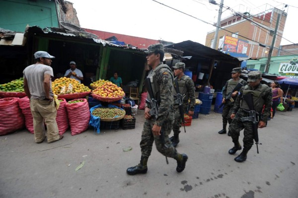 Con 'impuesto de guerra', las pandillas arrasan pequeños negocios en Honduras