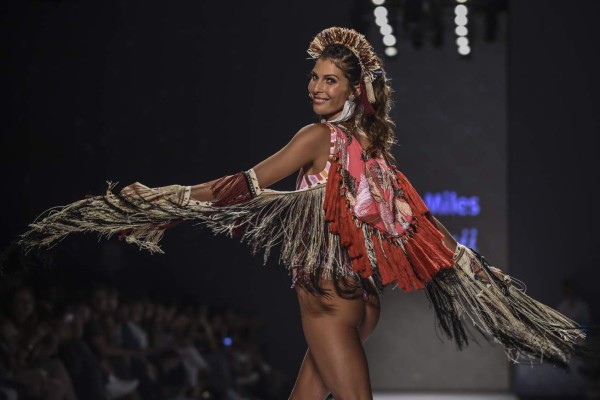 A model presents a creation of the brand Maaji during Colombiamoda, as part of Colombia's Fashion Week in Medellin, Antioquia department, Colombia on July 24, 2018. Colombiamoda will take place between July 24 and 26. / AFP PHOTO / JOAQUIN SARMIENTO