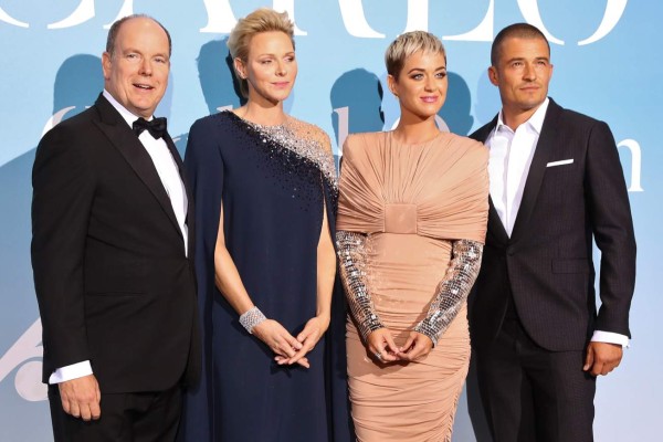 (fromL) Albert II of Monaco and Charlene of Monaco pose with US singer Katy Perry and British actor Orlando Bloom upon their arrival at the 2nd Monte-Carlo Gala for the Global Ocean 2018 held in Monaco on September 26, 2018.On September 26, 2018, the Prince Albert II of Monaco Foundation will hold its second Monte-Carlo Gala for the Global Ocean, a major fundraising event in the heart of Monte Carlo, in order to support its worldwide initiatives in favor of a sustainable ocean, a crucial issue calling for immediate and collective action. / AFP PHOTO / Valery HACHE