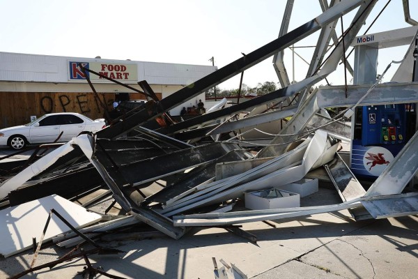 NAPLES, FL - SEPTEMBER 12: A destroyed gas station stands in a rural part of Naples two days after Hurricane Irma swept through the area on September 12, 2017 in Naples, Florida. Hurricane Irma made another landfall near Naples yesterday after inundating the Florida Keys. Electricity was out in much of the region with extensive flooding. Spencer Platt/Getty Images/AFP== FOR NEWSPAPERS, INTERNET, TELCOS & TELEVISION USE ONLY ==