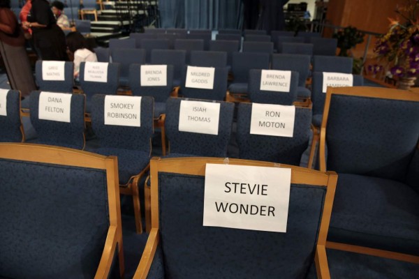 This photo shows seats marked for Stevie Wonder and other guests at the Greater Grace Temple ahead of Aretha Franklin's funeral on August 30, 2018 in Detroit, Michigan.Franklin's funeral will take place on August 31. The 76-year-old singer, beloved by millions around the world, died of cancer on August 16, closing the curtain on a glittering six-decade career that made her one of America's most celebrated artists. / AFP PHOTO / JEFF KOWALSKY