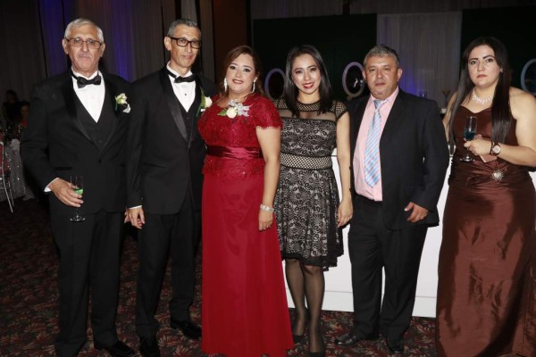 Arturo, Jorge y Ligia Romero con Judith Gómez
