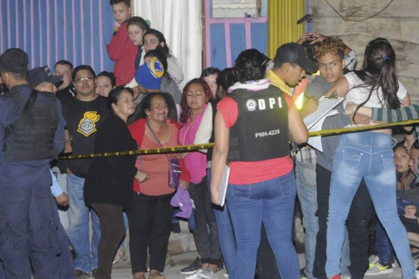 En la calle velan a dos de los muertos en masacre de Tegucigalpa