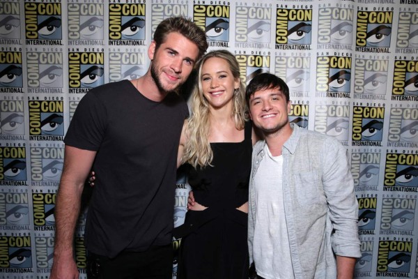 Liam Hemsworth, Josh Hutcherson and Jennifer Lawrence seen at Lionsgate “The Hunger Games: Mockingjay Part 2' Presentation at 2015 Comic Con on Thursday, July 9, 2015, in San Diego. (Photo by Eric Charbonneau/Invision for Lionsgate/AP Images)