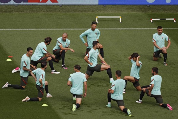 Portugal's forward Cristiano Ronaldo (C, top) attends an MD-1 training session at the Illovsky Rudolph Stadium in Budapest on June 14, 2021, on the eve of their UEFA EURO 2020 Group F football match against Hungary. (Photo by Laszlo Balogh / AFP)