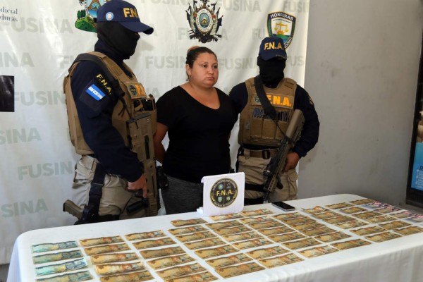 Acusan por extorsión a mujer capturada en sector Chamelecón