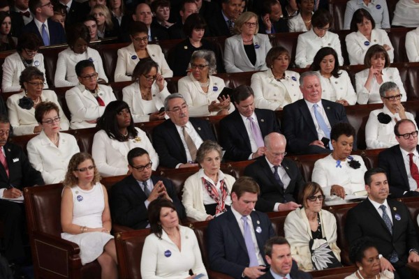 WASHINGTON, DC - FEBRUARY 28: Members of congress wear white to honor the women's suffrage movement and support women's rights as U.S. President Donald Trump addresses a joint session of the U.S. Congress on February 28, 2017 in the House chamber of the U.S. Capitol in Washington, DC. Trump's first address to Congress focused on national security, tax and regulatory reform, the economy, and healthcare. Alex Wong/Getty Images/AFP== FOR NEWSPAPERS, INTERNET, TELCOS & TELEVISION USE ONLY ==