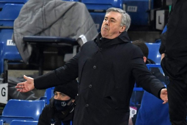 Everton's Italian head coach Carlo Ancelotti gestures on the touchline during the English Premier League football match between Chelsea and Everton at Stamford Bridge in London on March 8, 2021. (Photo by Glyn KIRK / POOL / AFP) / RESTRICTED TO EDITORIAL USE. No use with unauthorized audio, video, data, fixture lists, club/league logos or 'live' services. Online in-match use limited to 120 images. An additional 40 images may be used in extra time. No video emulation. Social media in-match use limited to 120 images. An additional 40 images may be used in extra time. No use in betting publications, games or single club/league/player publications. /