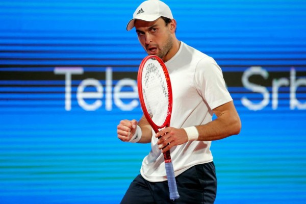 Russia's Aslan Karatsev reacts during his ATP 250 Serbia Open semi-final singles tennis match against Serbia's Novak Djokovic at The Novak Tennis Centre in Belgrade on April 24, 2021. (Photo by PEDJA MILOSAVLJEVIC / AFP)