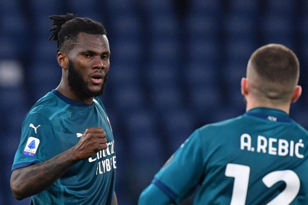 AC Milan's Ivorian midfielder Franck Kessie celebrates after opening the scoring during the Italian Serie A football match AS Roma vs AC Milan on February 28, 2021 at the Olympic stadium in Rome. (Photo by Tiziana FABI / AFP)