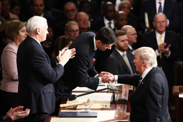 WASHINGTON, DC - FEBRUARY 28: U.S. President Donald Trump shakes hands with House Speaker Rep. Paul Ryan (R-WI) after addressing a joint session of the U.S. Congress on February 28, 2017 in the House chamber of the U.S. Capitol in Washington, DC. Trump's first address to Congress focused on national security, tax and regulatory reform, the economy, and healthcare. Win McNamee/Getty Images/AFP== FOR NEWSPAPERS, INTERNET, TELCOS & TELEVISION USE ONLY ==