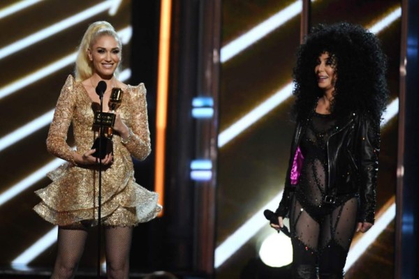 LAS VEGAS, NV - MAY 21: Honoree Cher (R) accepts the Billboard Icon Award from singer Gwen Stefani onstage during the 2017 Billboard Music Awards at T-Mobile Arena on May 21, 2017 in Las Vegas, Nevada. Ethan Miller/Getty Images/AFP