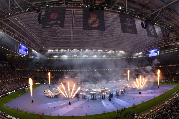 TOPSHOT - The Black Eyed Peas perform prior to the UEFA Champions League final football match between Juventus and Real Madrid at The Principality Stadium in Cardiff, south Wales, on June 3, 2017. / AFP PHOTO / Ben STANSALL