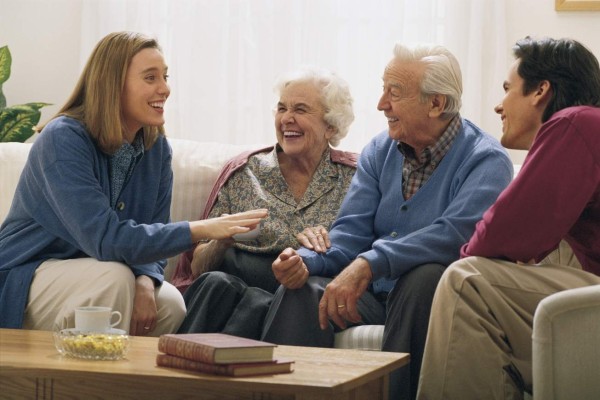 Family in living room talking