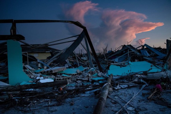 A view of damage from Hurricane Dorian on September 5, 2019, in Marsh Harbor, Great Abaco, Bahamas. - The death toll from Hurricane Dorian has risen to 30 in the Bahamas, Prime Minister Hubert Minnis told American network CNN on Thursday.Authorities had previously reported 20 dead, but have warned that the final figure is sure to be far higher. (Photo by Brendan Smialowski / AFP)