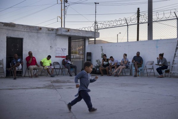 CIUDAD JUAREZ, MEXICO - JUNE 05: Migrants mostly from Guatemala, Honduras, Cuba, El Salvador and parts of Africa relax in the courtyard of the Albergue Para Migrantes El Buen Samaritano as they wait to have their number on a waiting list that is months long to be called to have an initial interview with an United States asylum officer on June 05, 2019 in Ciudad Juarez, Mexico. For the third month in a row, detentions along the United States border topped 100,000 people. Joe Raedle/Getty Images/AFP