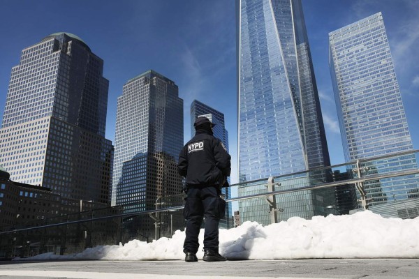 NEW YORK, NY - MARCH 20: A counter terrorism officer stands in front of One World Trade Center at ground zero in Manhattan on March 20, 2017 in New York City. Senate Minority Leader Chuck Schumer has been voicing criticism of President Donald Trump's proposed budget that could cut as much as $190 million from New York City efforts to fight terrorism. Following two major terrorist attacks and numerous foiled plots, New York City is considered the nation's prime target for terrorists. The NYPD has stated that it costs $500,000 a day to pay for the nearly 200 police officers in and around Trump Tower on Fifth Ave. Spencer Platt/Getty Images/AFP== FOR NEWSPAPERS, INTERNET, TELCOS & TELEVISION USE ONLY ==