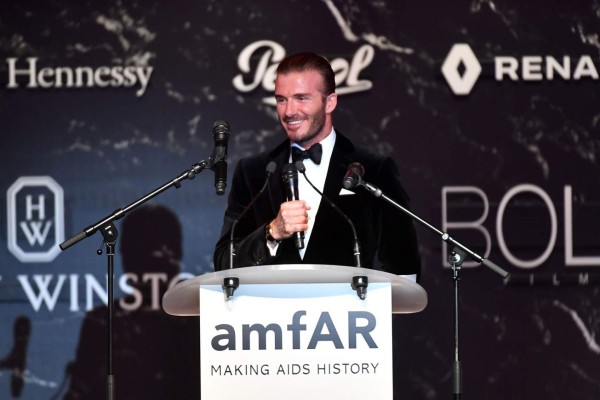 Former England football captain David Beckham talks during the amfAR's 24th Cinema Against AIDS Gala on May 25, 2017 at the Hotel du Cap-Eden-Roc in Cap d'Antibes, France. / AFP PHOTO / ALBERTO PIZZOLI