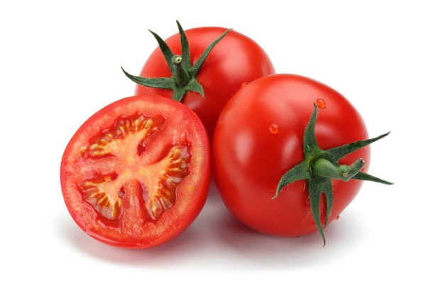 Fresh tomatoes isolated on white background