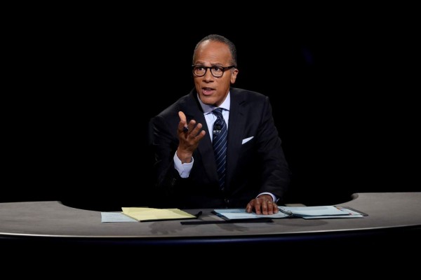 HEMPSTEAD, NY - SEPTEMBER 26: Moderator Lester Holt listens during the Presidential Debate at Hofstra University on September 26, 2016 in Hempstead, New York. The first of four debates for the 2016 Election, three Presidential and one Vice Presidential, is moderated by NBC's Lester Holt. Joe Raedle/Getty Images/AFP== FOR NEWSPAPERS, INTERNET, TELCOS & TELEVISION USE ONLY ==