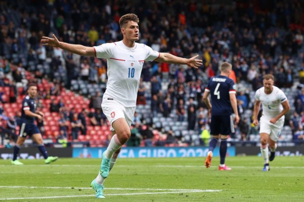 Czech Republic's forward Patrik Schick (L) celebrates scoring his team's first goal during the UEFA EURO 2020 Group D football match between Scotland and Czech Republic at Hampden Park in Glasgow on June 14, 2021. (Photo by LEE SMITH / POOL / AFP)