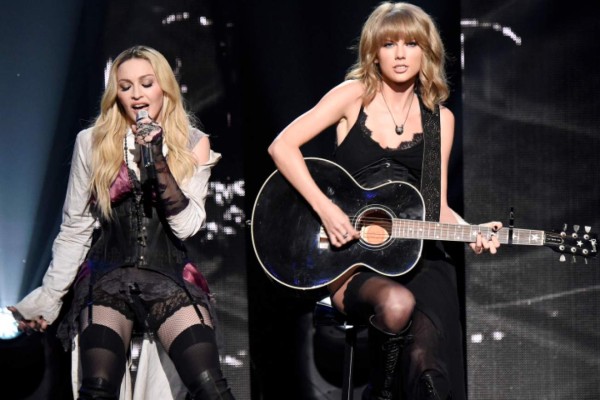 LOS ANGELES, CA - MARCH 29: Singers Madonna (L) and Taylor Swift perform onstage during the 2015 iHeartRadio Music Awards which broadcasted live on NBC from The Shrine Auditorium on March 29, 2015 in Los Angeles, California. (Photo by Kevin Mazur/Getty Images for iHeartMedia)