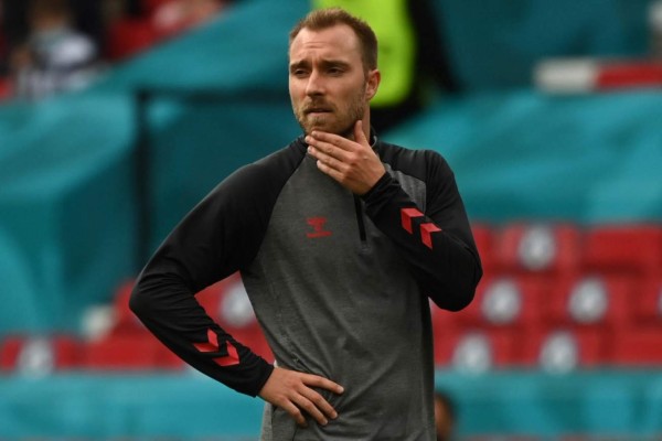 Denmark's midfielder Christian Eriksen warms up before the UEFA EURO 2020 Group B football match between Denmark and Finland at the Parken Stadium in Copenhagen on June 12, 2021. (Photo by Jonathan NACKSTRAND / various sources / AFP)