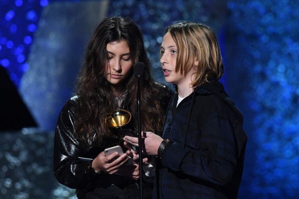 The children of late Chris Cornell Toni Cornell (L) and Christopher Cornell Jr accept the award for Best Rock performance for 'When bad does good' on behalf of their father during the 61st Annual Grammy Awards pre-telecast show on February 10, 2019, in Los Angeles. (Photo by Robyn Beck / AFP)