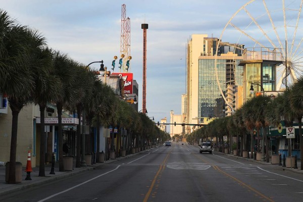 MYRTLE BEACH, SC - SEPTEMBER 12: A normally busy Ocean blvd is desolate as people vacated the area ahead of the arrival of Hurricane Florence on September 12, 2018 in Myrtle Beach, United States. Hurricane Florence is expected on Friday possibly as a category 4 storm along the Virginia, North Carolina and South Carolina coastline. Joe Raedle/Getty Images/AFP== FOR NEWSPAPERS, INTERNET, TELCOS & TELEVISION USE ONLY ==