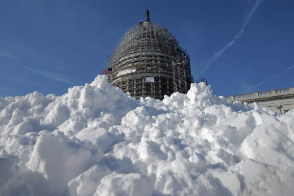 WASHINGTON, DC - JANUARY 21: A pile of shoveled snow stands in the plaza on the east side of the U.S. Capitol January 21, 2016 in Washington, DC. One inch of snowfall delayed school openings in the greater Washington, DC, area on Thursday as people along the Easter Seaboard prepare for a blizzard to arrive within the next 24 hours. Chip Somodevilla/Getty Images/AFP== FOR NEWSPAPERS, INTERNET, TELCOS & TELEVISION USE ONLY ==